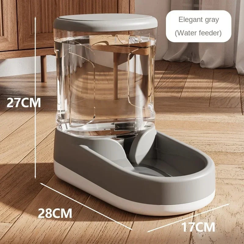 Gray water feeder with dimensions on a wooden floor