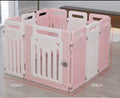 Pink and white plastic pet playpen with a gate, shown on a light wood floor with overlaid dimension lines and text indicating 103cm by 103cm by 73cm measurements.