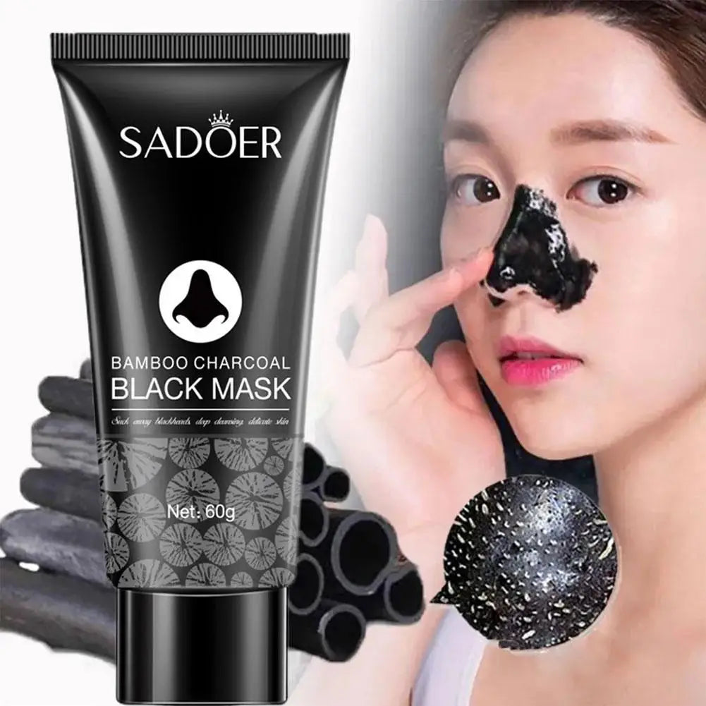 SADOER Bamboo Charcoal Black Mask with a woman applying it to her nose.