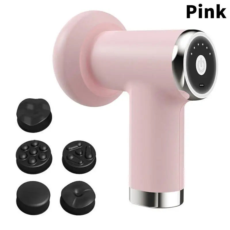 A pink handheld massage gun with a round head and silver metallic accents, shown alongside six black interchangeable massage attachments on a plain white background. The word 'Pink' is printed in black text in the top right corner.