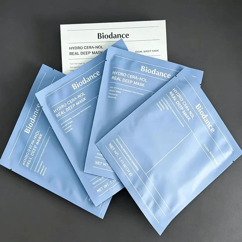 Biodance hydro cera-nol real deep mask packets on a dark background