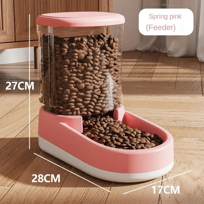 Pink pet feeder with measurements on a wooden floor
