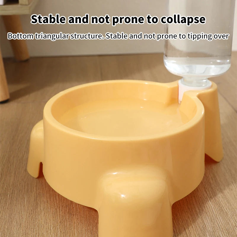 Yellow pet water bowl with a triangular base on a wooden floor, filled with water.