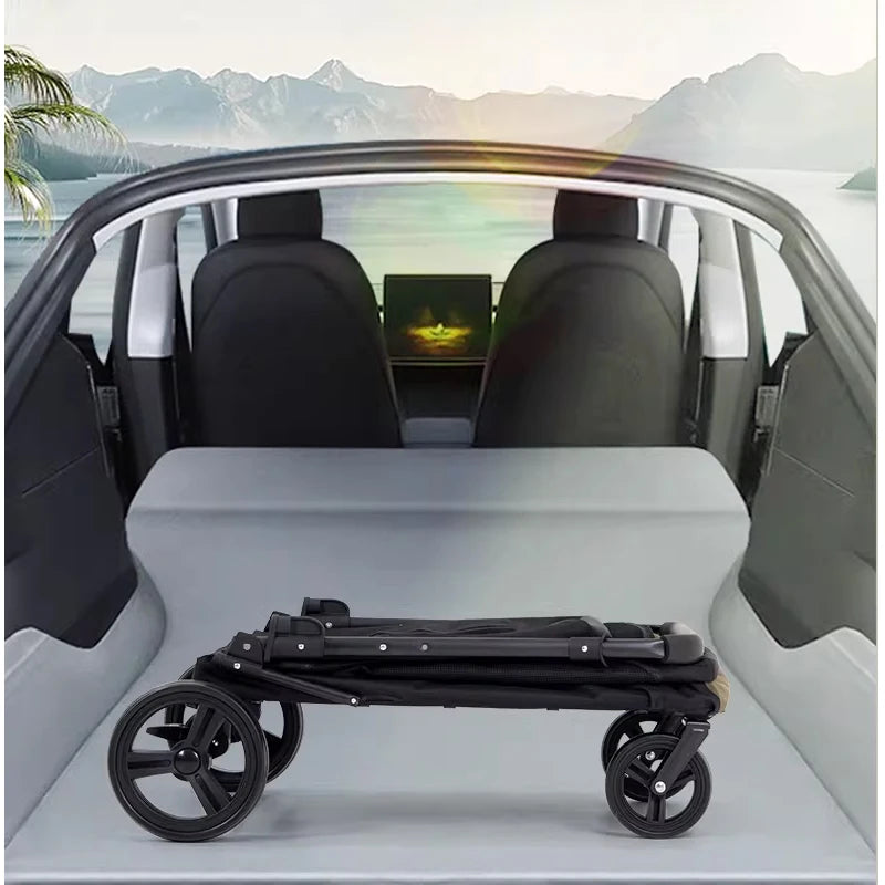 Car interior with a flatbed and a folded black stroller on a scenic background