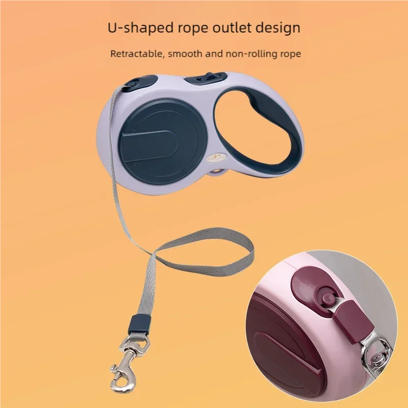Retractable dog leash with U-shaped rope outlet design on an orange background