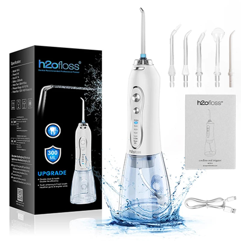 h2ofloss dental water flosser with packaging and attachments on a white background