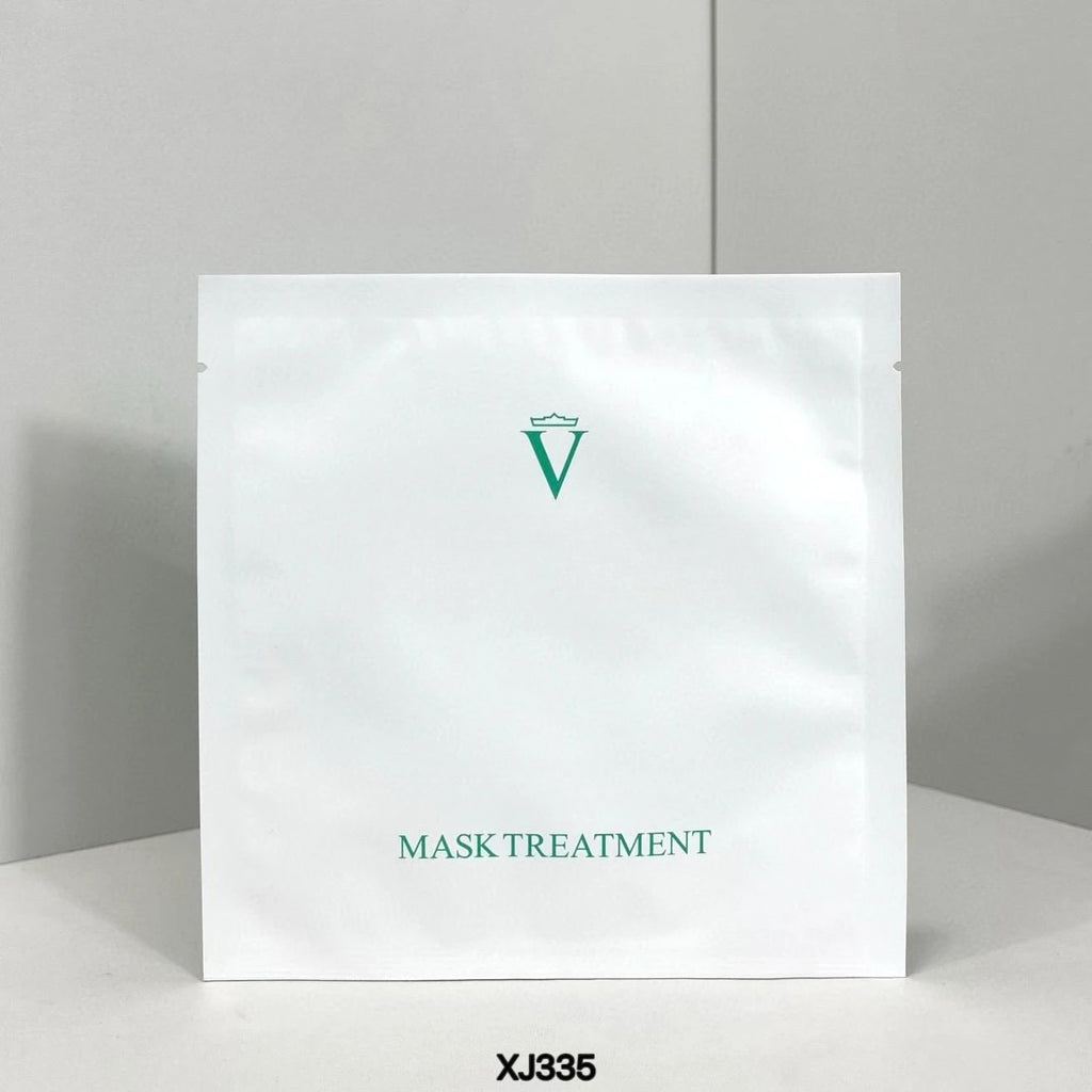 White mask treatment package with a green logo and text on a gray background