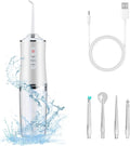 White dental water flosser with accessories on a white background