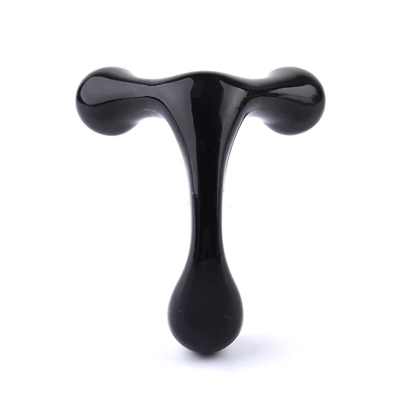 Black T-shaped object on a white background