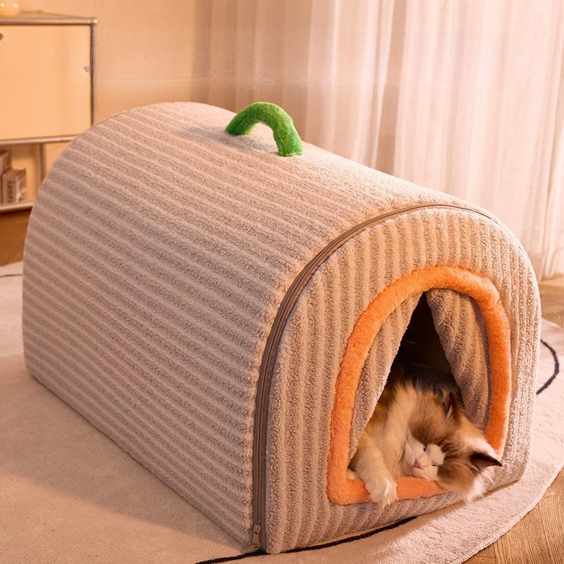 Pet bed with a cat inside on a soft surface