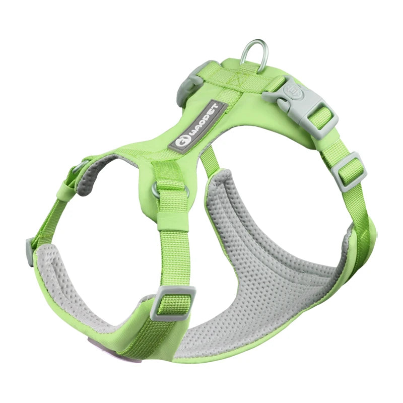 Green dog harness with gray padding on a white background