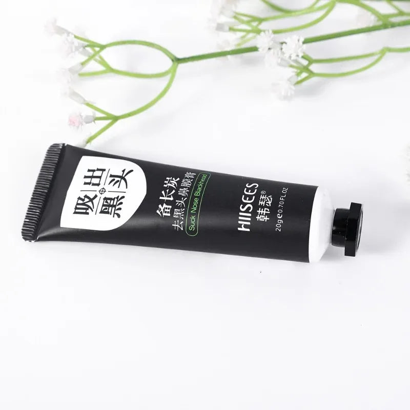 Blackhead removal cream tube with white label on a white background