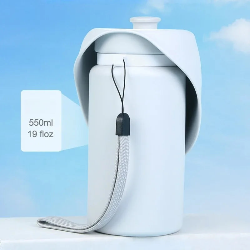 White water bottle with a strap on a light blue background