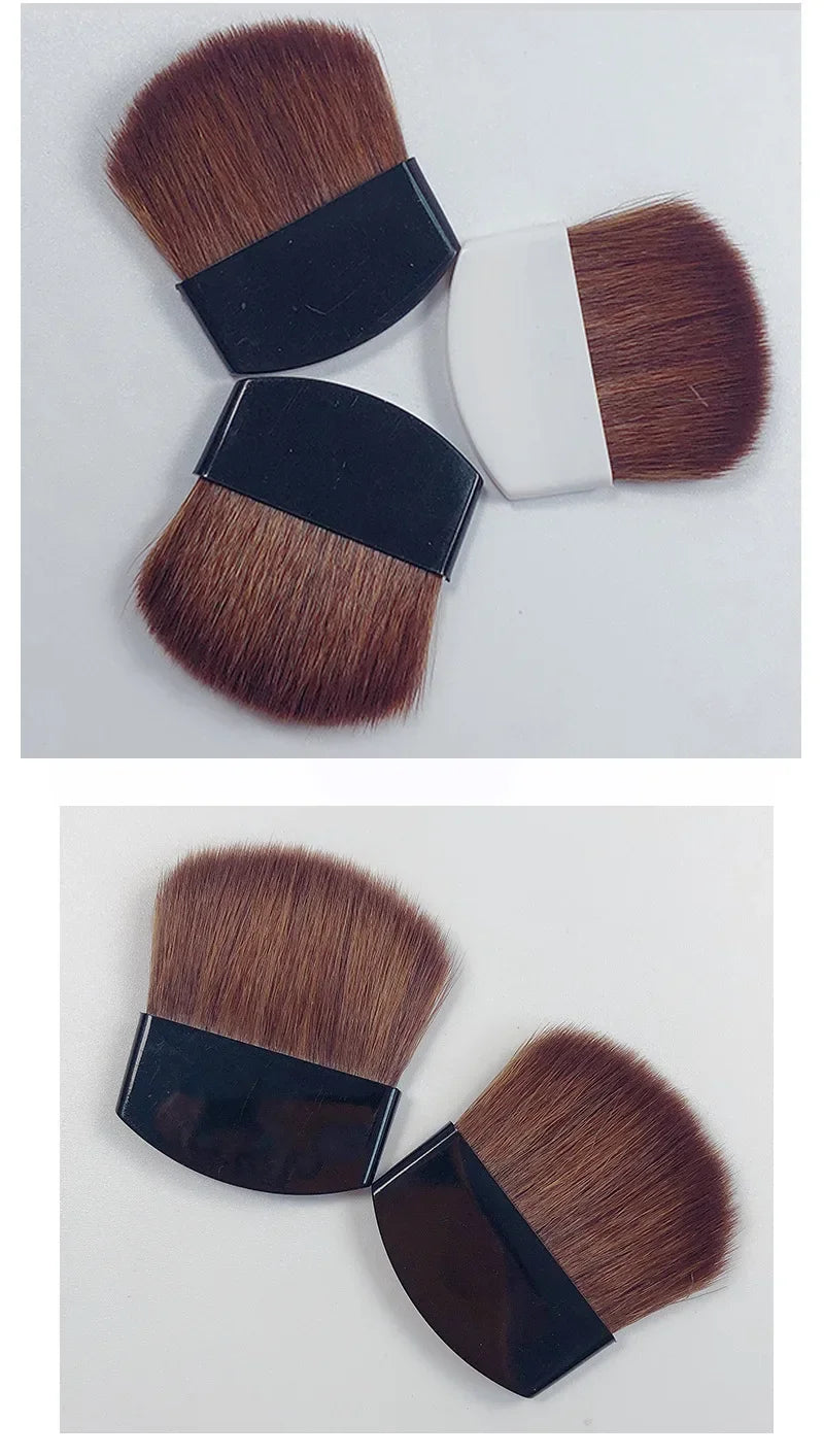 Set of makeup brushes with brown bristles and black handles on a white background