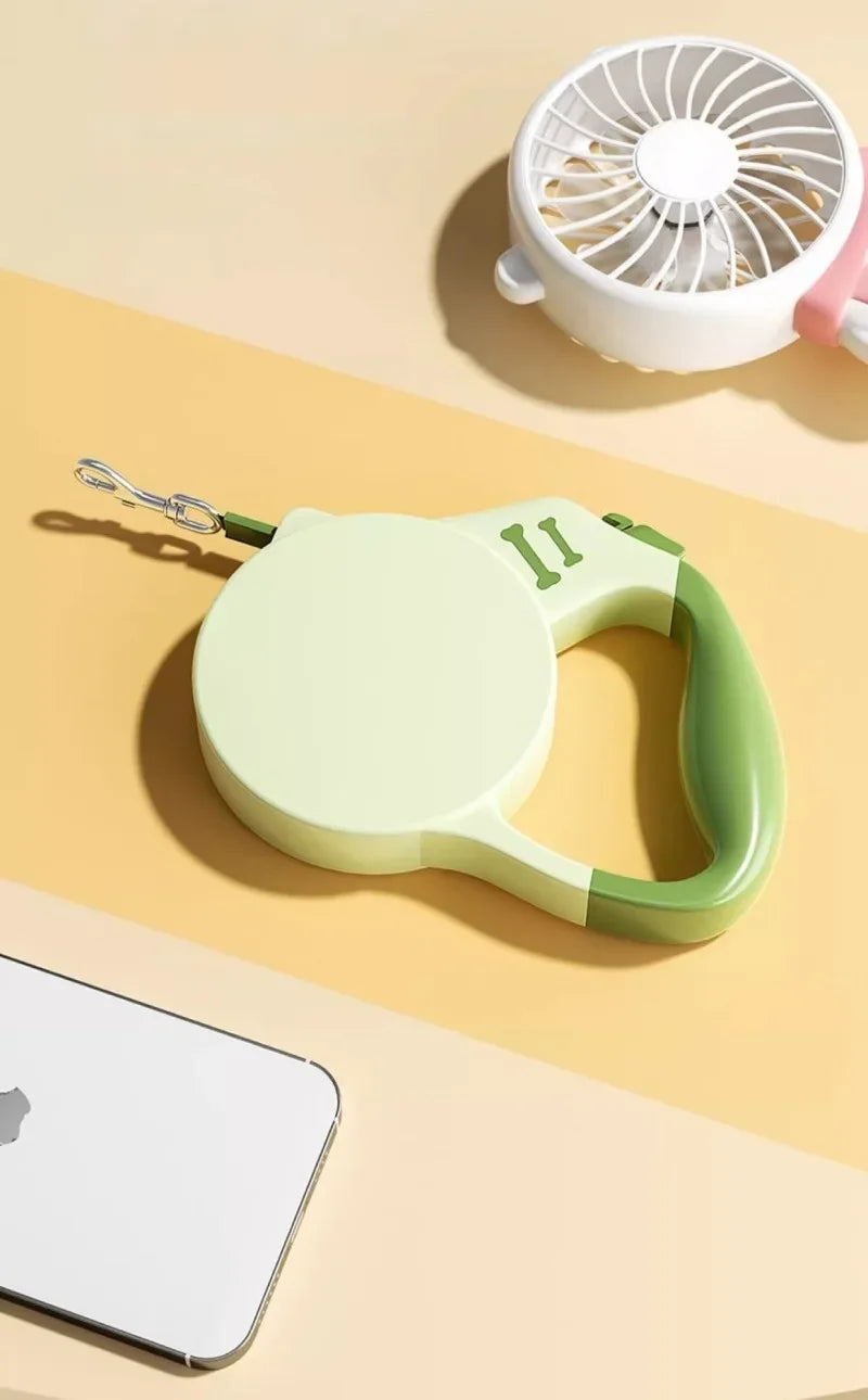 Green dog leash with clip on a yellow and beige gradient background