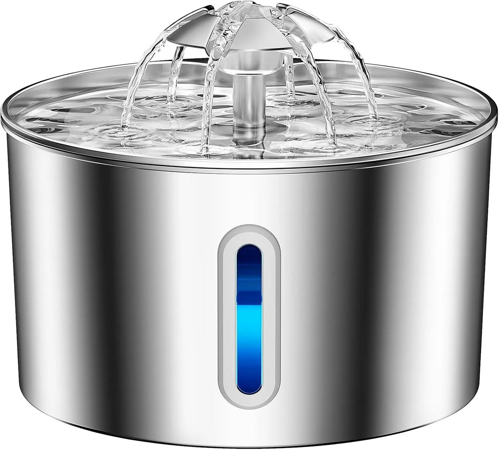 A stainless steel pet water fountain with a clear water reservoir and a vertical blue LED indicator light on the front, shown against a solid white background.