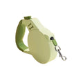 Light green retractable dog leash on a white background