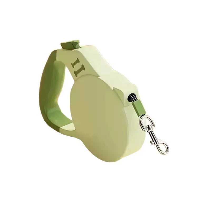 Light green retractable dog leash on a white background