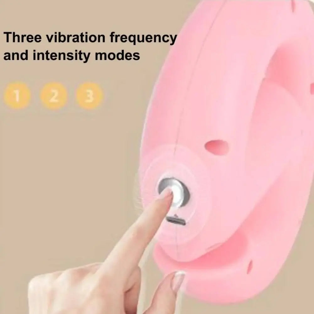 A close-up of a pink handheld device with a finger pressing a button on its side. Text on the image reads 'Three vibration frequency and intensity modes' with three numbered circles.