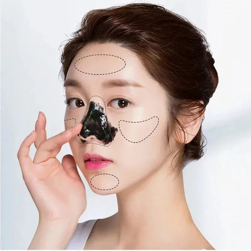 Woman applying blackhead removal patch with labeled areas on her face.